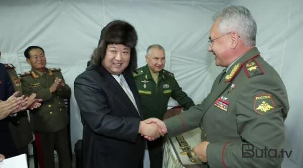  Kim Çen İn ölkəsinə zirehli gödəkçə ilə qayıtdı  