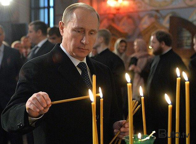  Putin kilsədə şam yandırdı - Video  
