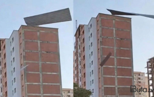 Bakıda güclü külək binanın damını uçurdu - Video